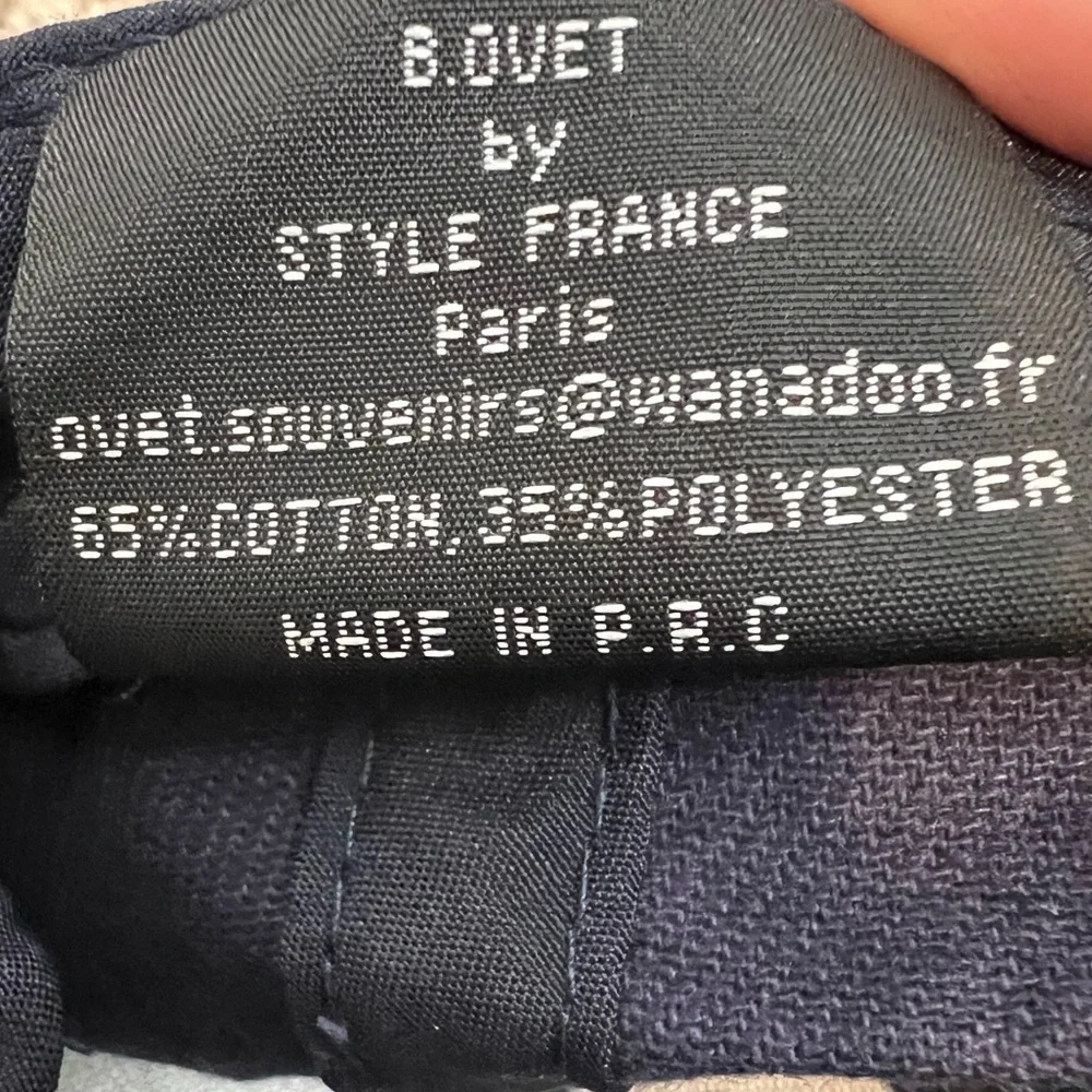 B. Ovet by Style France Paris Navy Blue Eiffel Tower Logo Baseball Cap Hat.